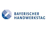 Logo of Bayerischer Handwerkstag featuring a geometric blue and gray design next to the organization's name in blue text.